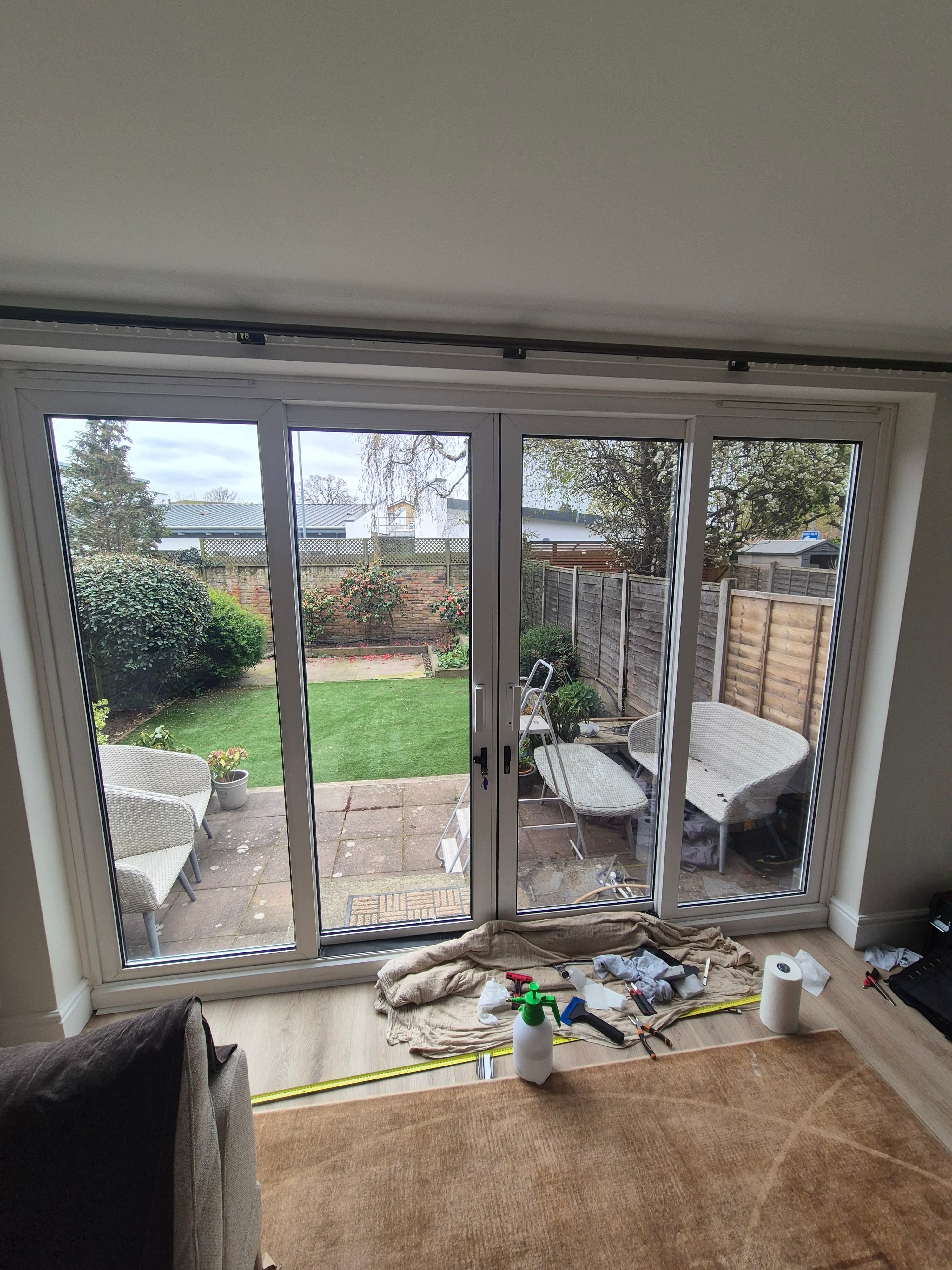 Fitting premium Natural Sputtered 30 architectural window film to flat glass in Slough