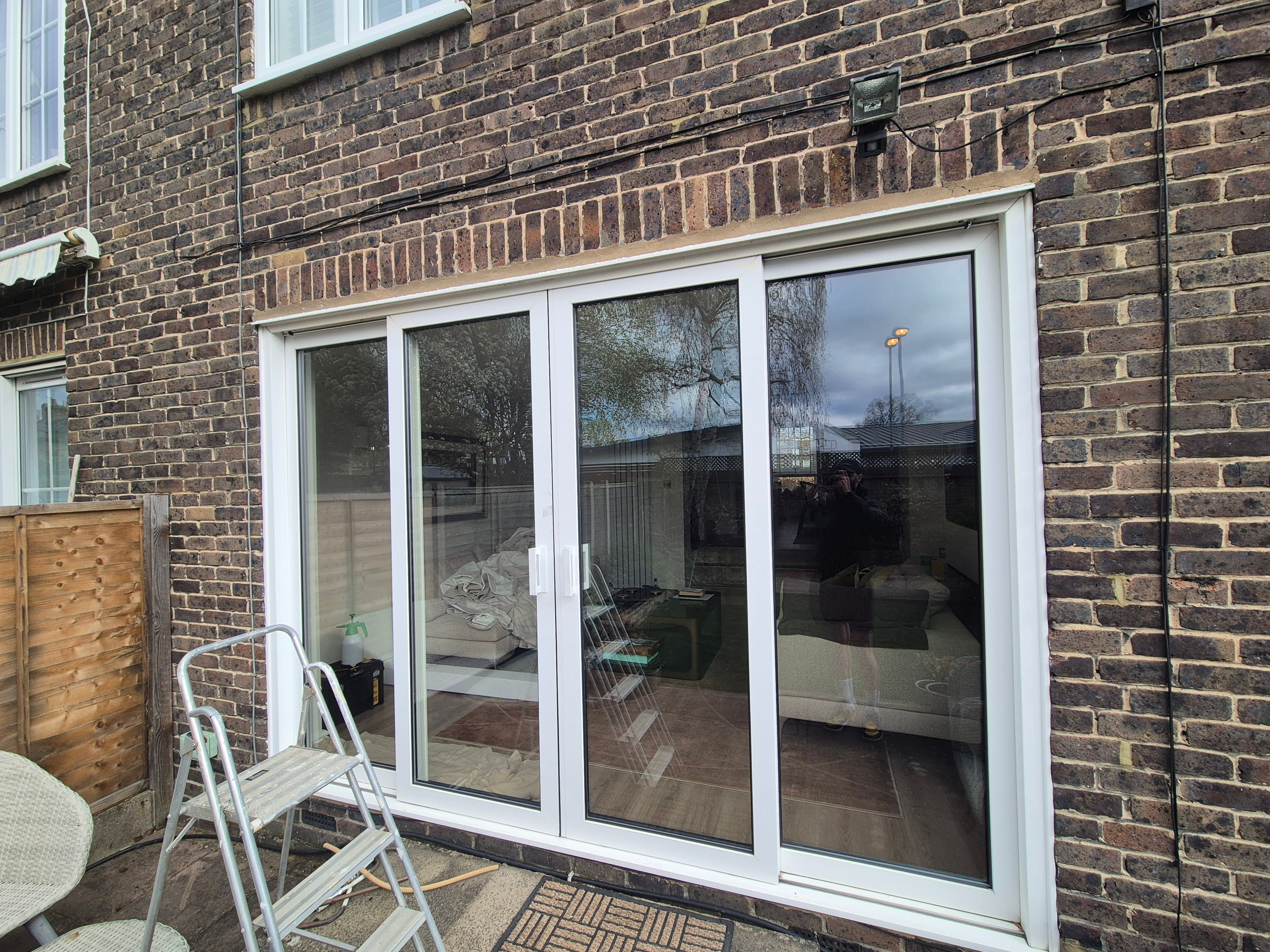 Unprotected 4-pane patio door in Oxford home before window film installation
