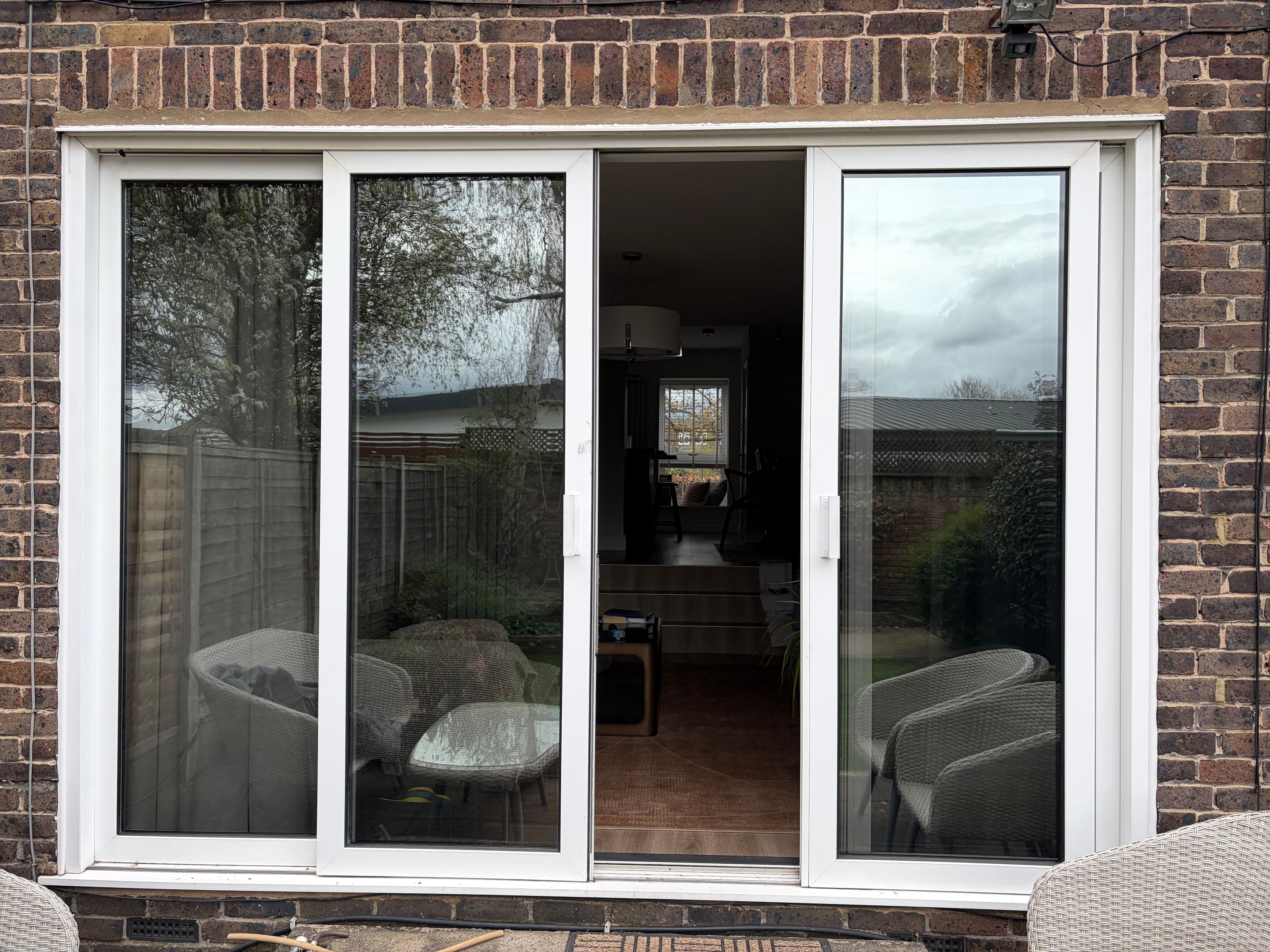 Bright garden room in Hemel Hempstead staying warmer after window film installation, with reduced heat loss and balanced natural light.